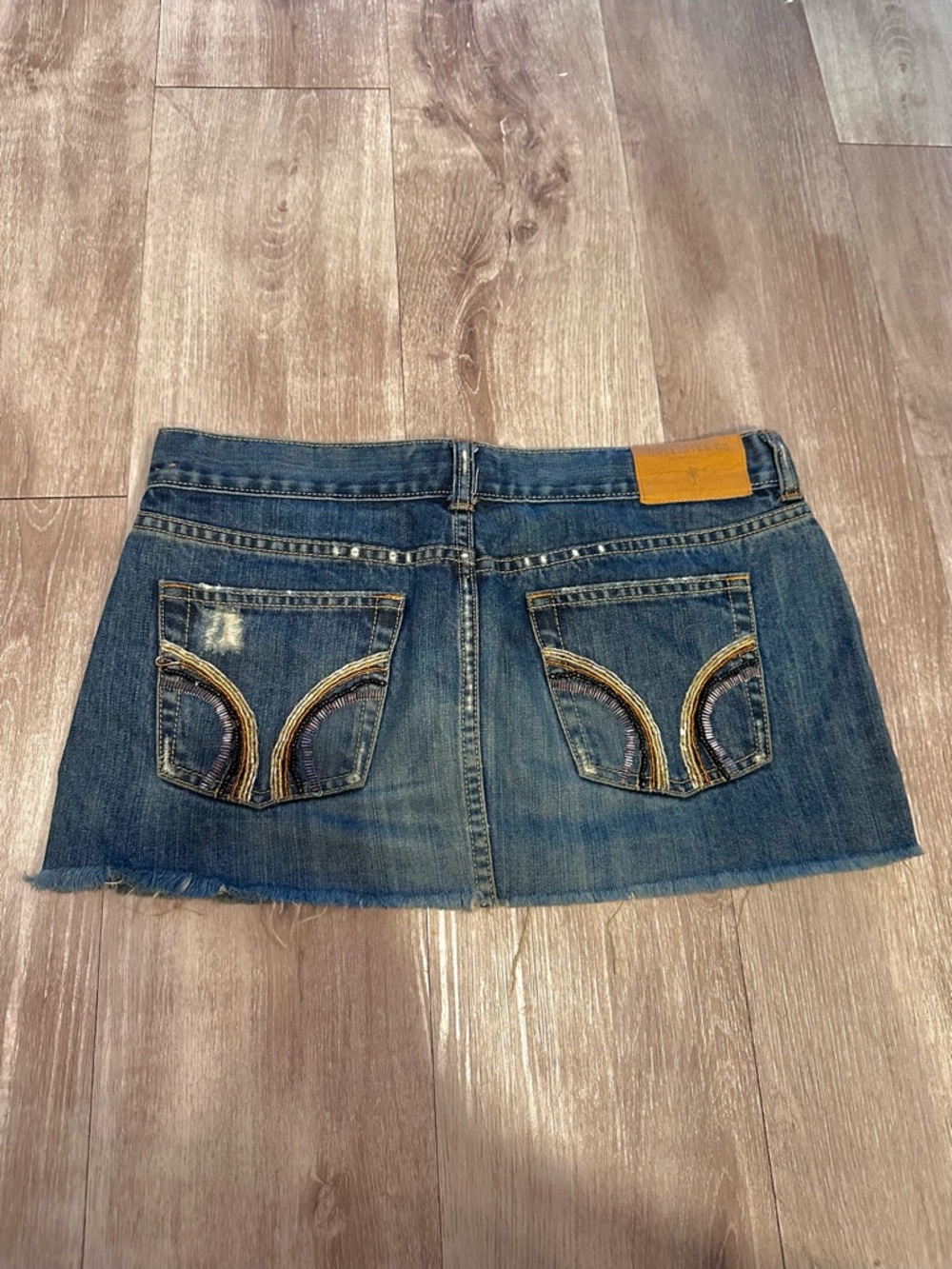 Denim Mini Skirt with Beaded Back Pockets - Blue